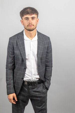 Portrait of a young businessman or entrepreneur in a jacked and an open neck shirt