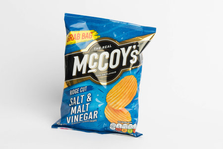 London, United Kingdom, 29th January 2024:- A packet of McCoys Salt and Vinegar British Potato...