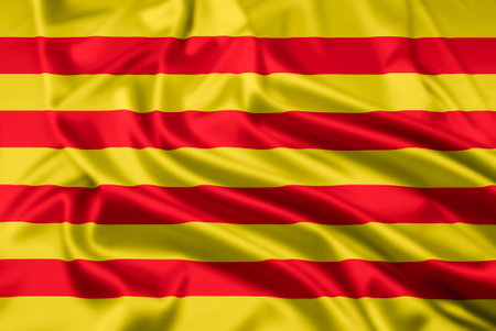 The Flag of Catalonia, one of the autonomous communities of Spain, with a ripple effectの写真素材