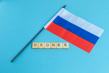 The National Flag of The Russian Federation, along with a sign reading Dronesの写真素材