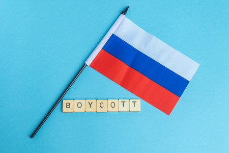 The National Flag of The Russian Federation, along with a sign reading Boycottの写真素材