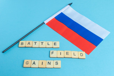 The National Flag of The Russian Federation, along with a sign reading Battle Field Gainsの写真素材
