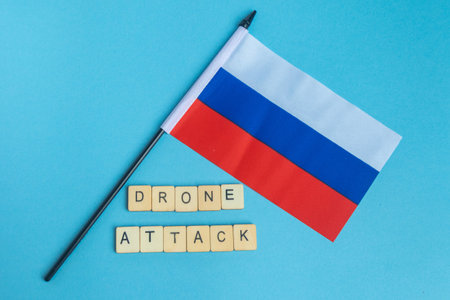 The National Flag of The Russian Federation, along with a sign reading Drone Attackの写真素材