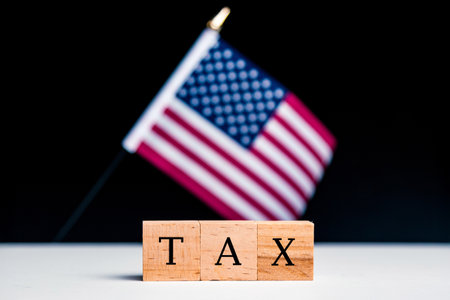 United States of America Concept, with selective focus on the US flag along with a sign reading Taxの写真素材