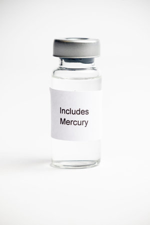 Vaccine concept, an Isolated medical vial with a label reading on a plain white background.の写真素材