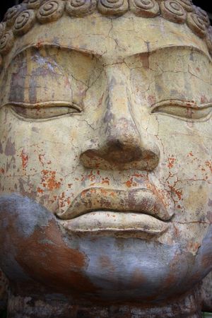 An ancient stlye big face sculpture.の写真素材