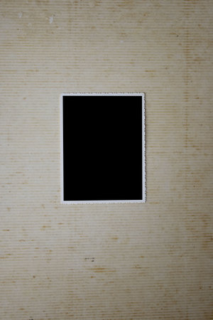 Background made from an open old grunge album with photo on it.