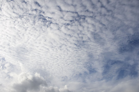 A Cloudy blue sky, can use as background in design.