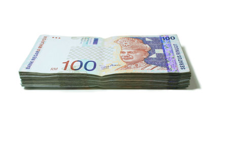 A stack of of RM100 Malaysia Notes.