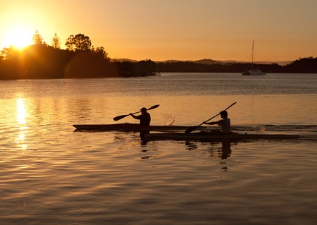Kayak at sunsetの写真素材