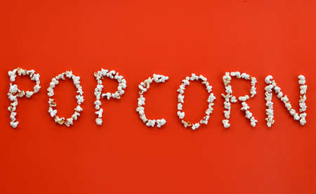 The word  POPCORN  written with popcornsの写真素材