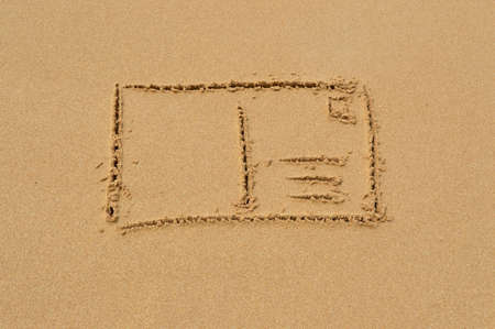 Postcard drawn in the sand at the beachの写真素材