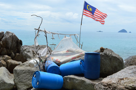 An open air bed built on the rocks with an amazing seaviewの写真素材