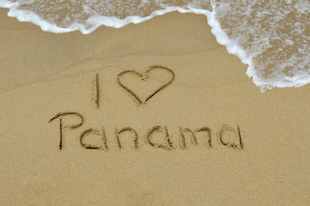 The text I love Panama written in the sand at the beachの写真素材