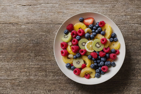 Tropical Temptation: Experience a symphony of flavors in our fruit salad, a paradise of freshness and vibrant colors.の素材