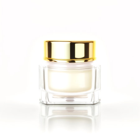 Cosmetic cream in a glass jar on a white background with reflectionの素材