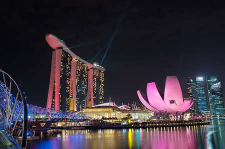 a photo of the modern building  in singapore  with the laser showのeditorial素材