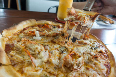 This is a photo of seafood pizzaの写真素材