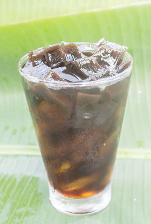 Black Jelly  in a glass with ice and syrup