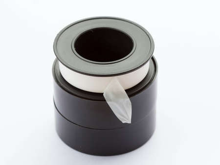 Pipe thread seal tape on white backgroundの写真素材