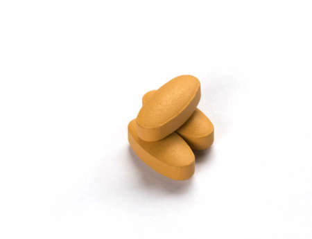 Vitamin pills on a white backgroundの写真素材