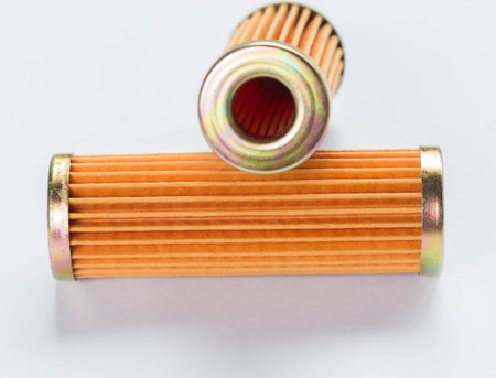 Oil filters on white background