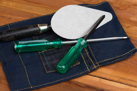 Tools on a wooden floorの写真素材