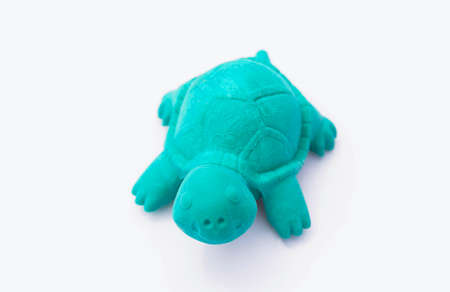 Turtles toys made of rubber on a white background.の写真素材