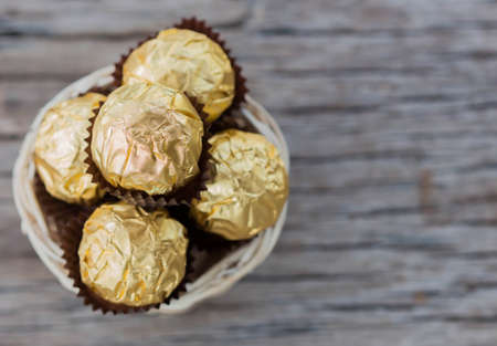 Chocolate on the wooden floorの写真素材