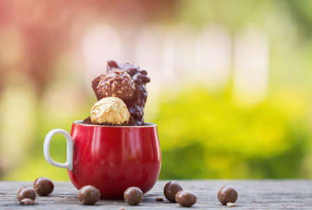 Chocolate on the wooden floorの写真素材