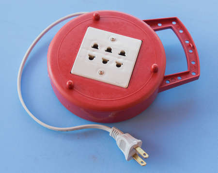 Red plug electrical power strip .の写真素材