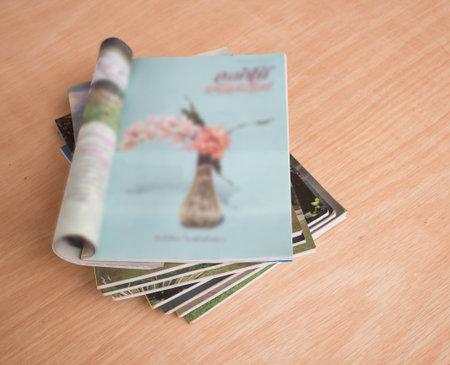 Magazine on a wooden table.