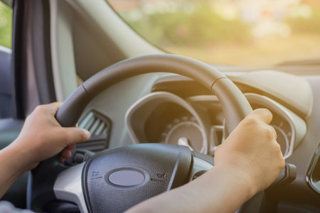 femaie driving car.
