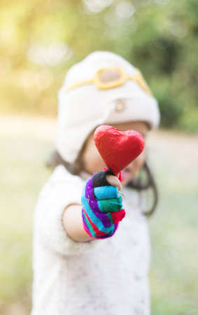 Children send red hearts.の写真素材