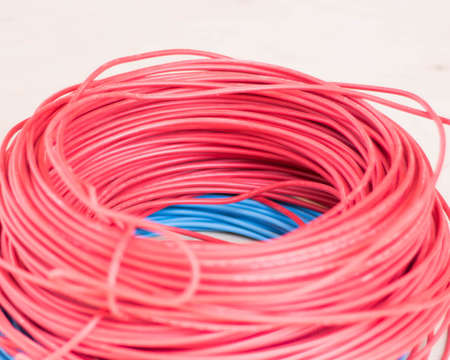 Roll of red and blue electic wire.の写真素材