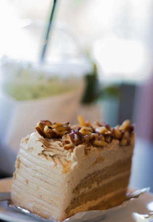 One piece of coffee cake on a plateの写真素材