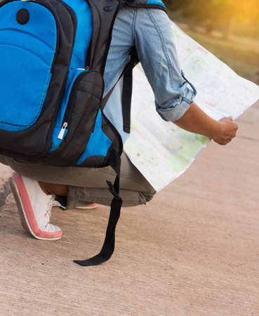 woman traveling with vintage backpack.