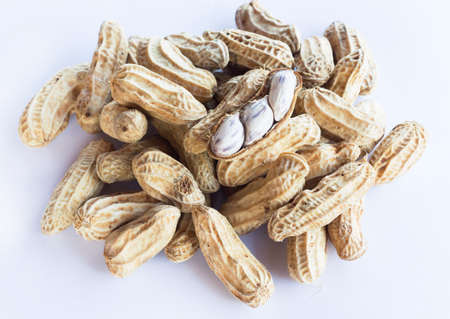 Peanuts boiled on a white background.の写真素材