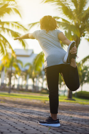 Women exercise in the park.