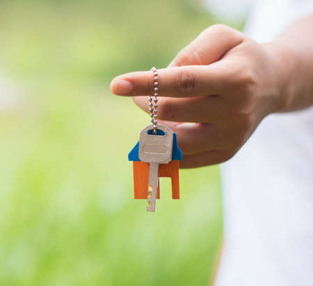 Women give keys.の写真素材