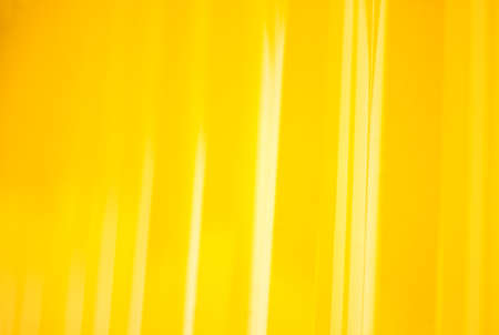 Close up of a yellow metal sheet, metal roof, Yellow Metal Sheet texture, backgroundの写真素材