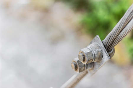 NUT hold the sling electricity post.の写真素材