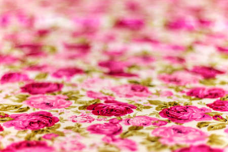 Rose fabric blur background, Fragment of colorful retro tapestryの写真素材