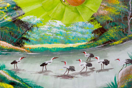 Pattern of painting  birds with river in the wild on umbrella handmade background in Chiang Mai, Thailandの写真素材