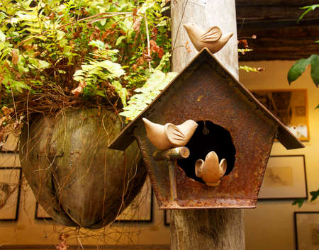 Old mailbox on old wood pillarの写真素材