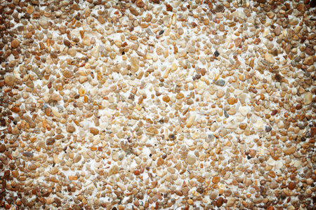 Wall of small sand stone texture background