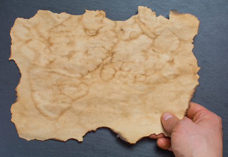 Ancient roll of paper and ancient Paper with space for textの写真素材