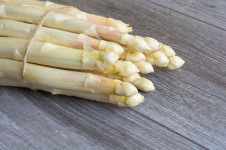 Bunch of fresh white and green asparagusの写真素材