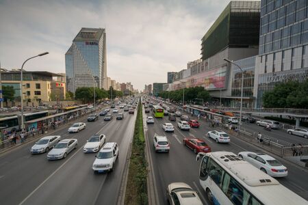 Beijing, China - June 18,  2015, the view on the road highly loaded with traffic leading to Beijing's financial center Gumao on a sunny day in Beijing Chinaのeditorial素材