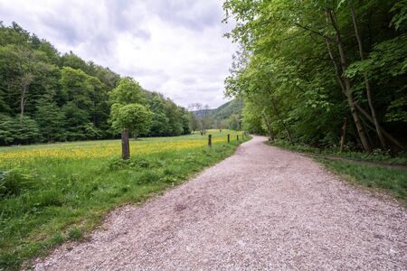 Uracher Waterfalls, Bad Urach, Germany on a cloudy dayの写真素材